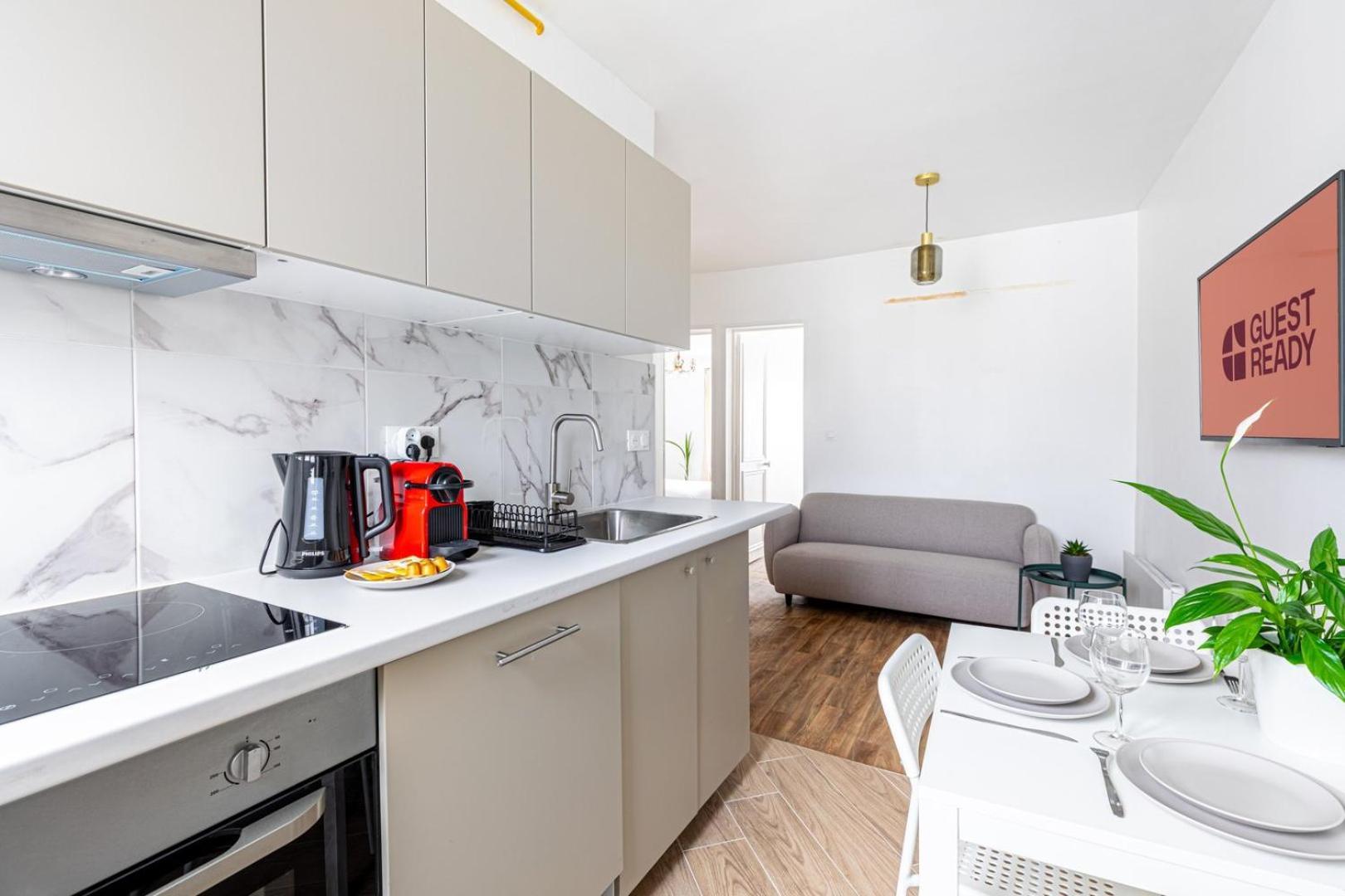 Guestready - Comfortable Nest In La Chapelle Appartement Parijs